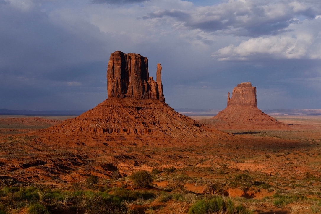 Stationery design of letterhead and business cards for the company Anders on top of a blurred photo of a house interior.